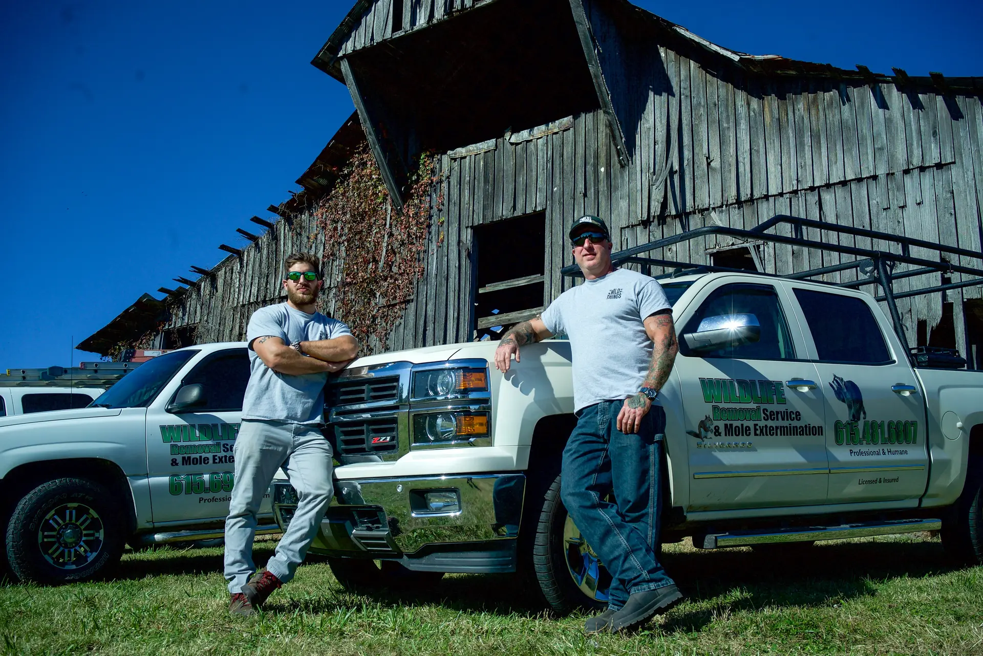 The Wild Things Wildlife Solutions crew and service trucks